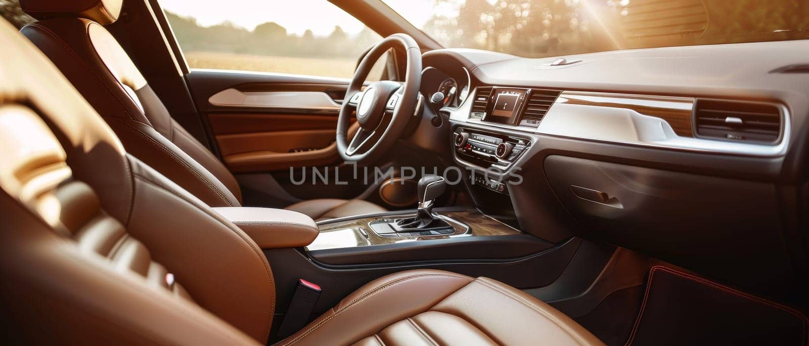 The setting sun casts a warm light over the car's brown leather interior. The seamless design emphasizes comfort and a serene driving experience