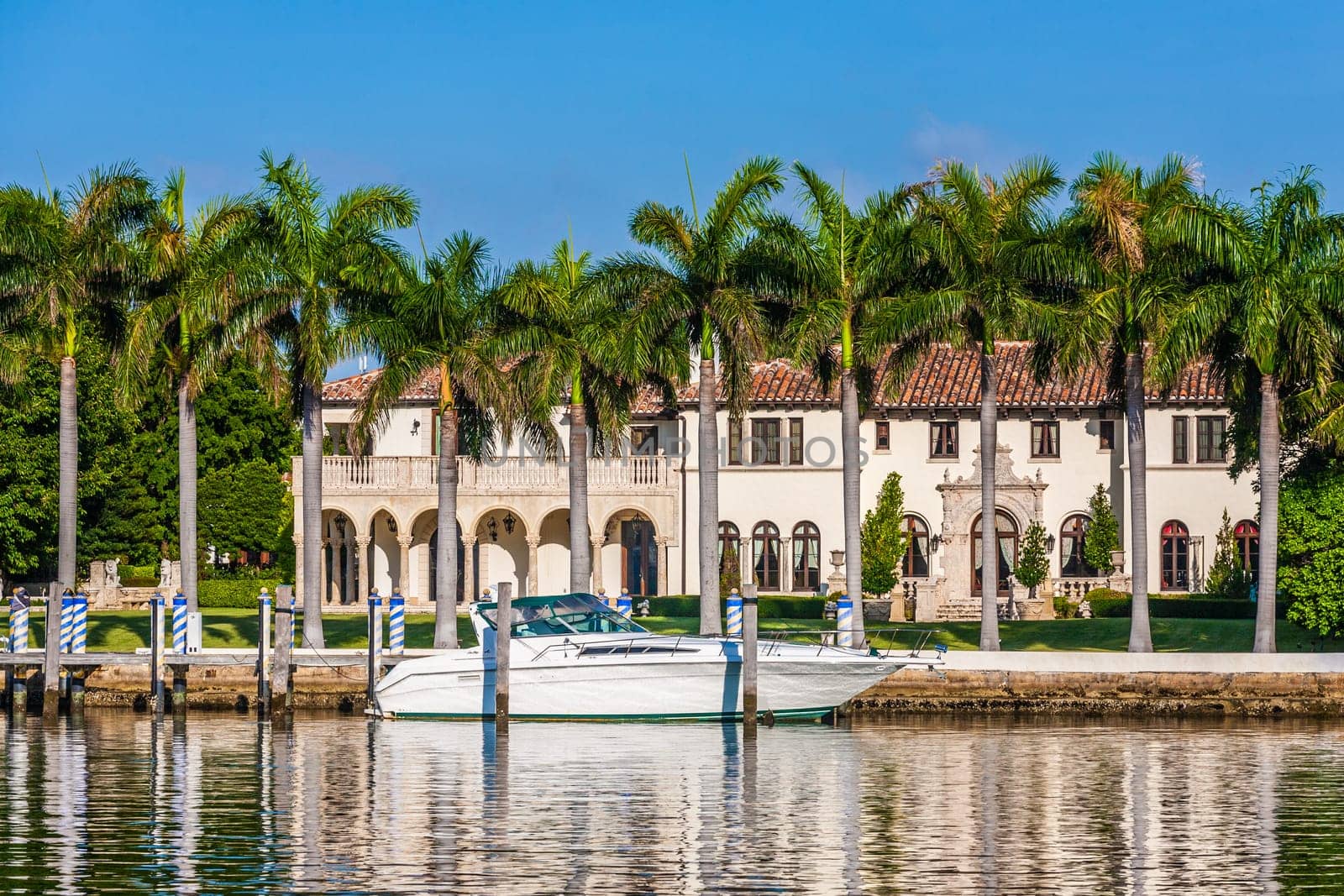 Miami Beach, USA - July 31, 2010: luxury houses at the canal in Miami Beach, USA. Pinetree Drive is the premier neighborhood for luxury homes.