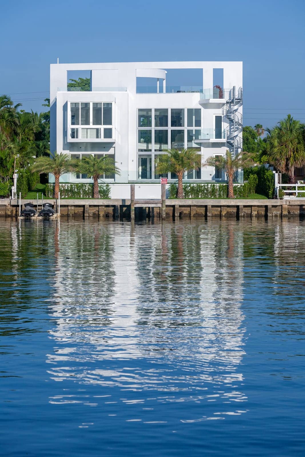 Miami Beach, USA - July 31, 2010: luxury houses at the canal in Miami Beach, USA. Pinetree Drive is the premier neighborhood for luxury homes.