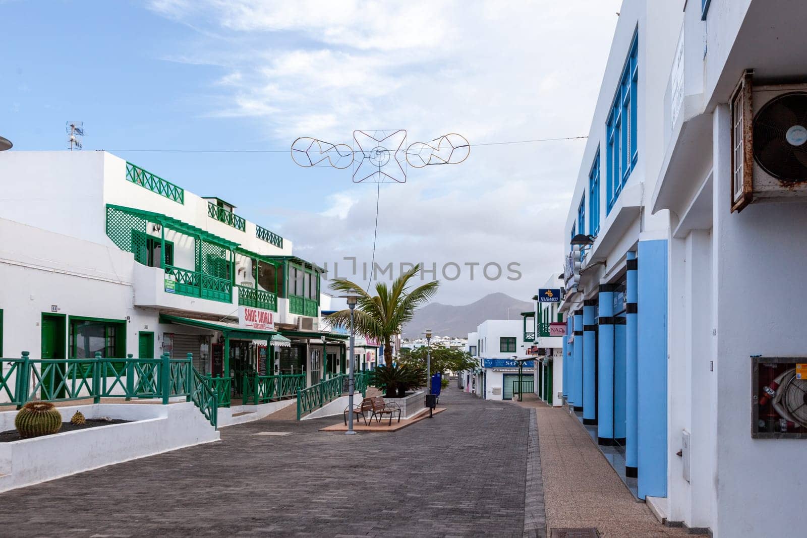 Playa Blanca, Spain - December 22, 2010: view to pedestrian zone in Playa Blanca in early morning without people.