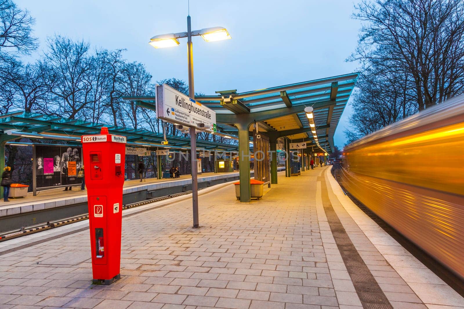 Hamburg, Germany - January 20, 2011: Metro Station Kellinghusen Strasse at night in Hamburg, Germany. The station is protected by a SOS telephone  phone with police connection.