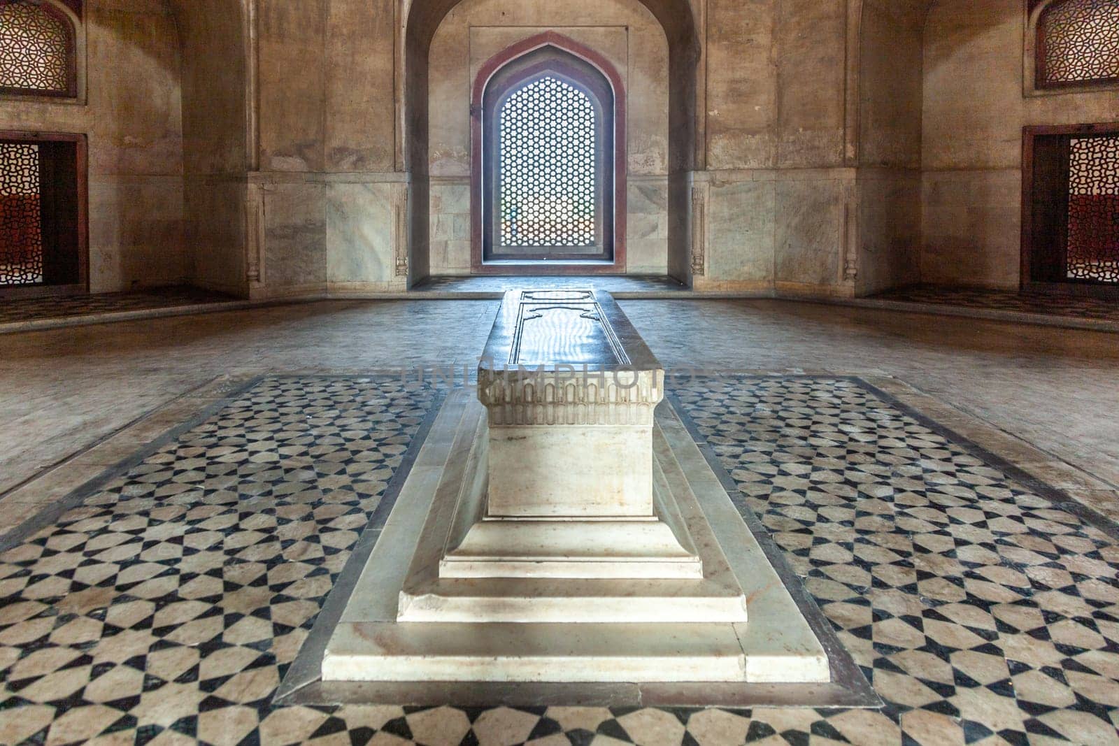 Delhi, India - November 11, 2011: beautiful floor with marble coffin  and ornaments in islamic style inside humayuns tomb in Delhi, India. Humayun's tomb is the tomb of the Mughal Emperor Humayun.