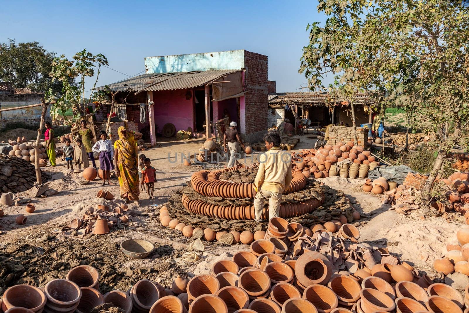 Fathepur Sikri, India - November 16, 2011: small pottery producing red ware in a small village near Fatehpur Sikri.