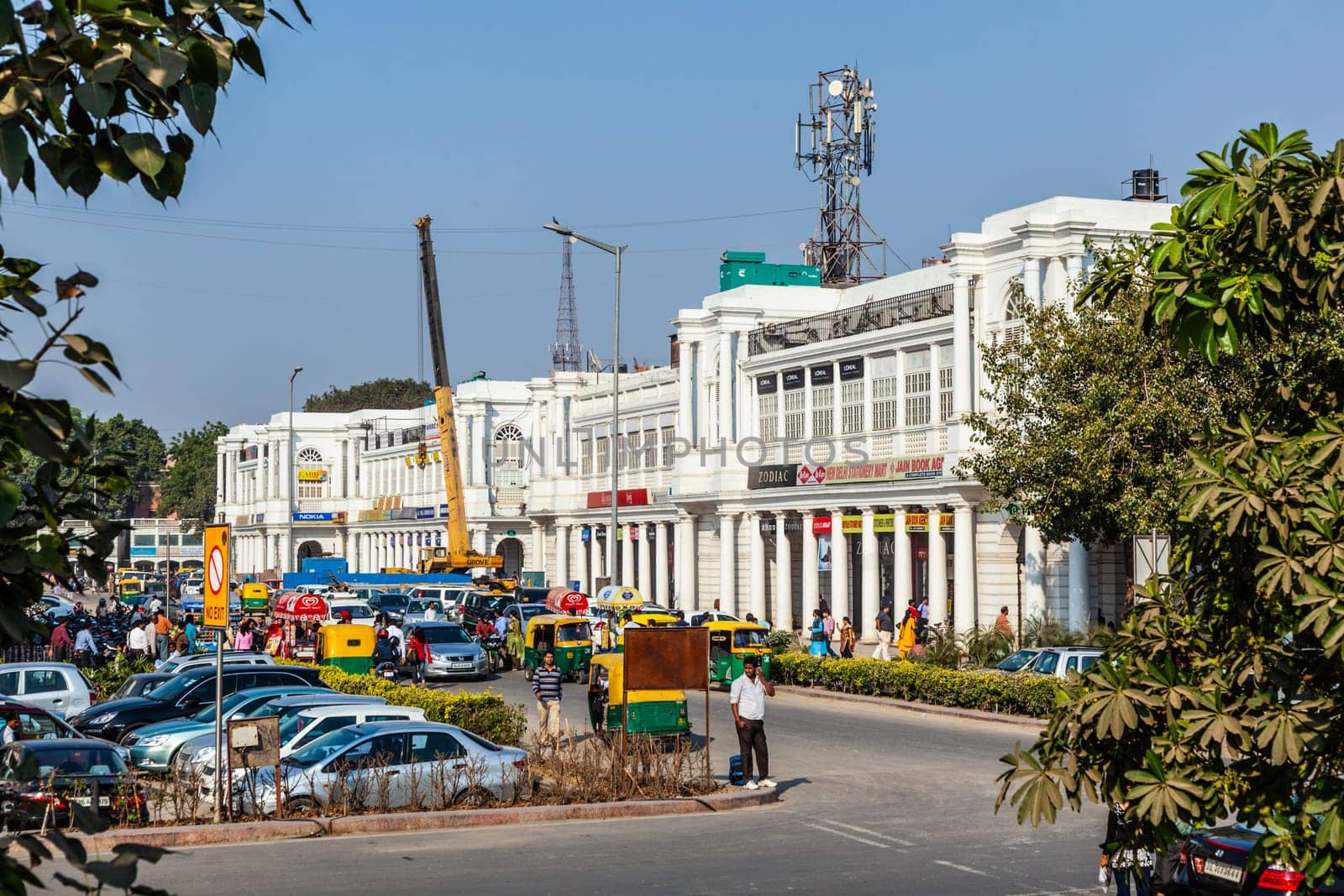New Delhi, India - November 17, 2011: streetlife at connaught place. Connaught Place is one of the busiest largest financial, commercial and business center in New Delhi.