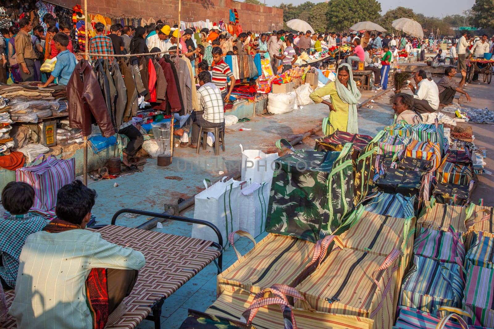 New Delhi, India - November 17, 2011: people at Meena Bazaar in Chandni Chowk area selling goods at the old open air market in India.