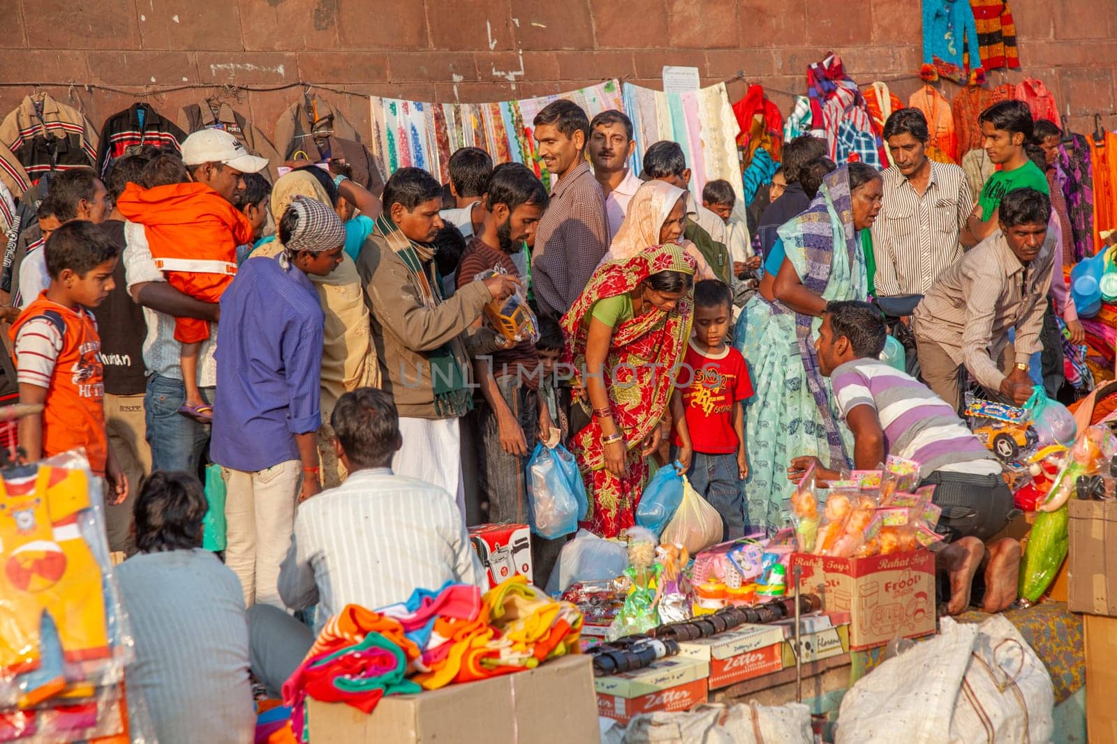 New Delhi, India - November 17, 2011: people at Meena Bazaar in Chandni Chowk area selling goods at the old open air market in India.