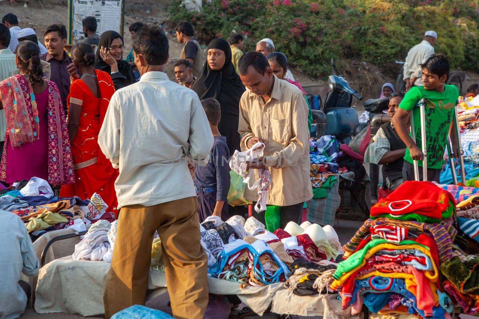 New Delhi, India - November 17, 2011: people at Meena Bazaar in Chandni Chowk area selling goods at the old open air market in India.
