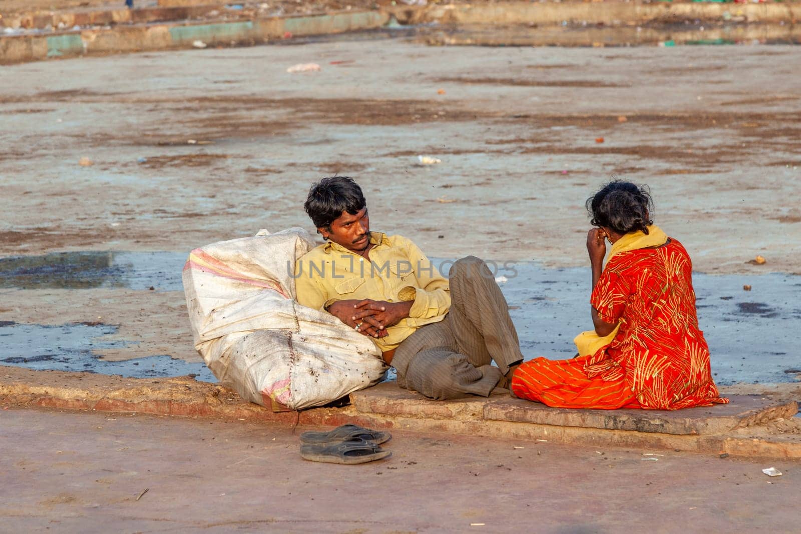 Delhi, India - November 17, 2011: poor homeless fpeople rest at the Meena Bazaar in area Chandni Chowk in New Delhi, India.