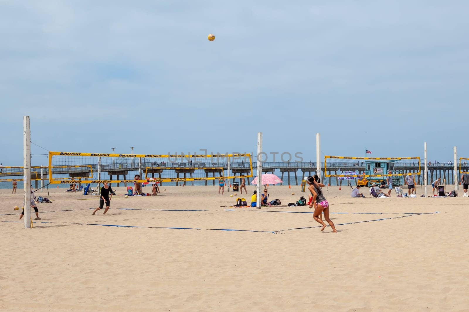 Redondo Beach - USA - June 6, 2012: people enjoy playing Volleyball at the fine sandy beach at Redondo Beach near Los Angeles.