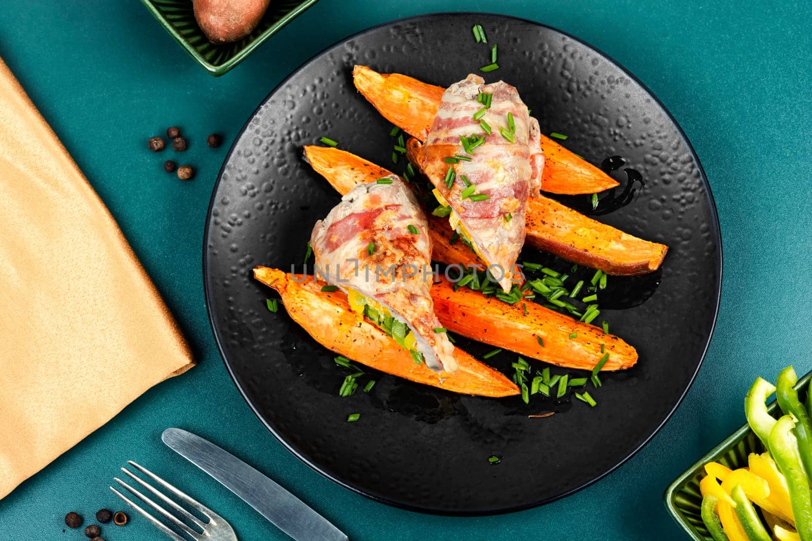 Roast pork meat roll and baked sweet potatoes.