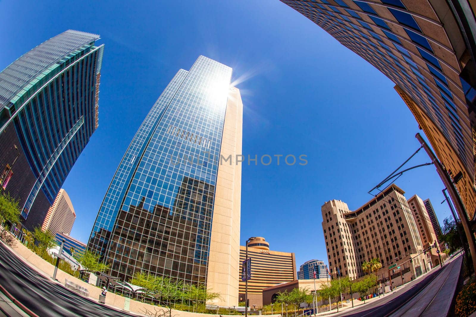 Phoenix, USA - June 14, 2012:  perspective of skyscrapers downtown at central avenue in Phoenix. Central Avenue represents almost every architectural use and style found in Phoenix.