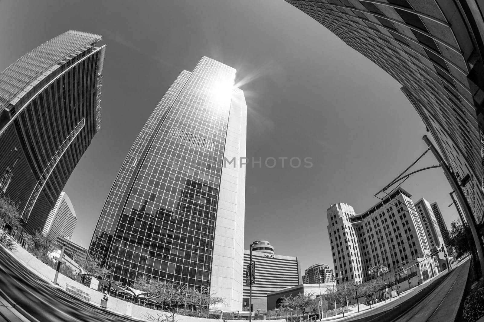 Phoenix, USA - June 14, 2012:  perspective of skyscrapers downtown at central avenue in Phoenix. Central Avenue represents almost every architectural use and style found in Phoenix.