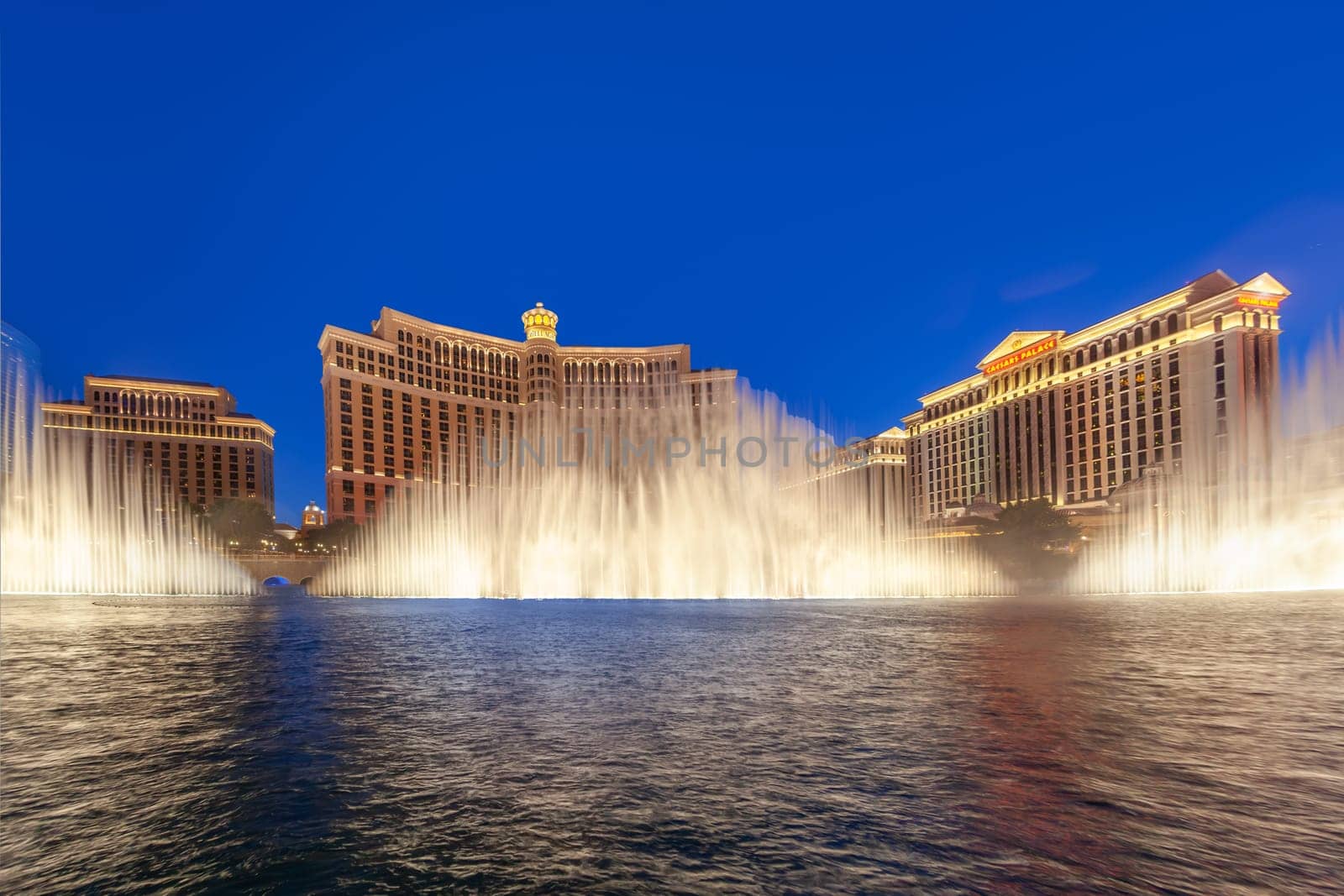 Las Vegas, USA - June 15, 2012: Las Vegas Bellagio Hotel Casino, featured with its world famous fountain show, at night with fountains in Las Vegas, Nevada.