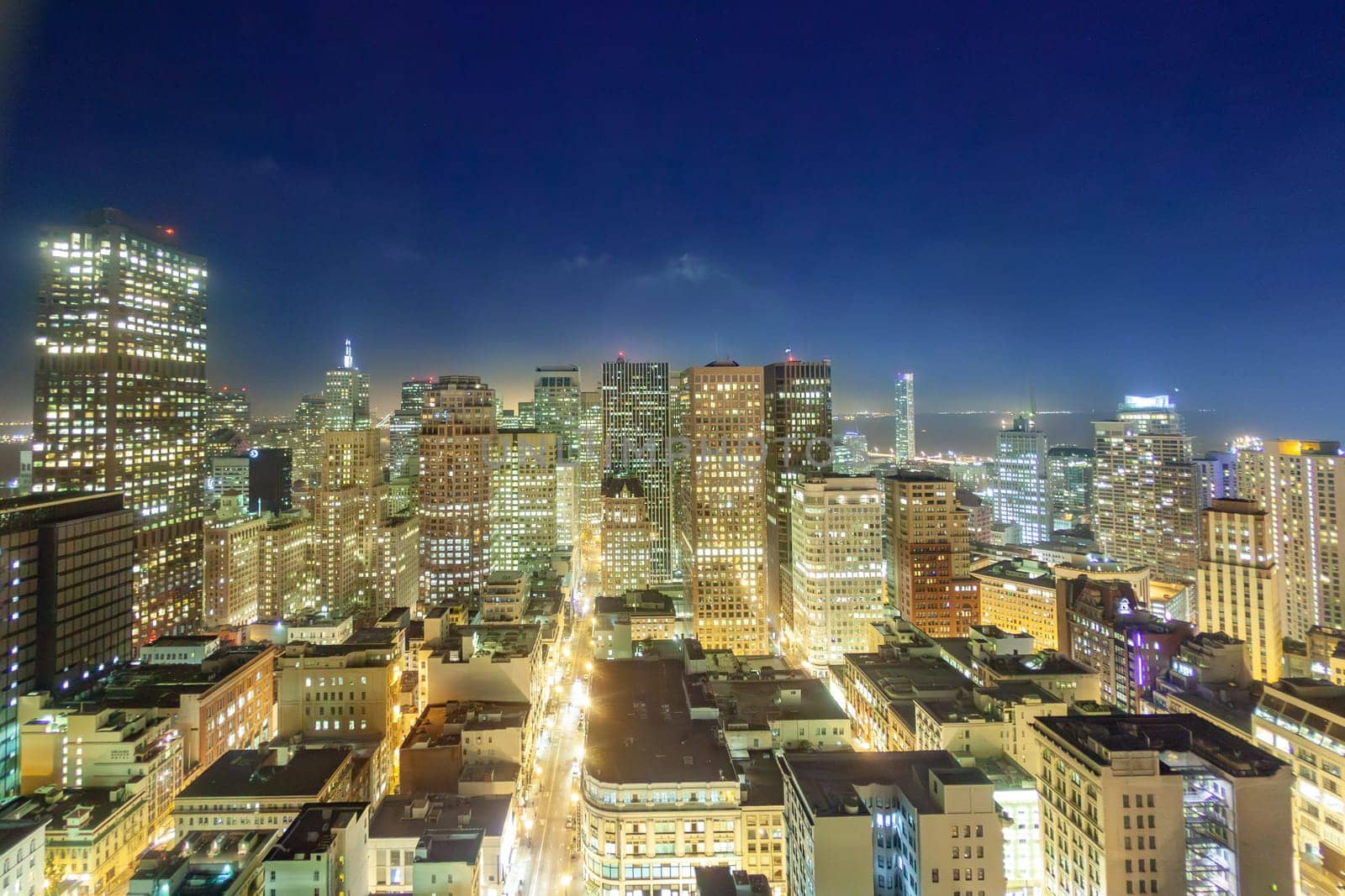 San Francisco, USA - June 20, 2012: aerial of San Francisco by night with facade of skyscraper