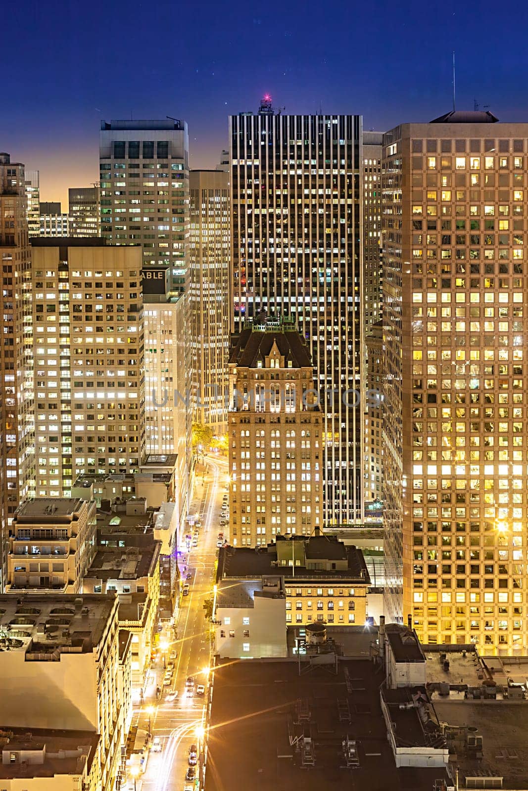 San Francisco, USA - June 20, 2012: aerial of San Francisco by night with facade of skyscraper.
