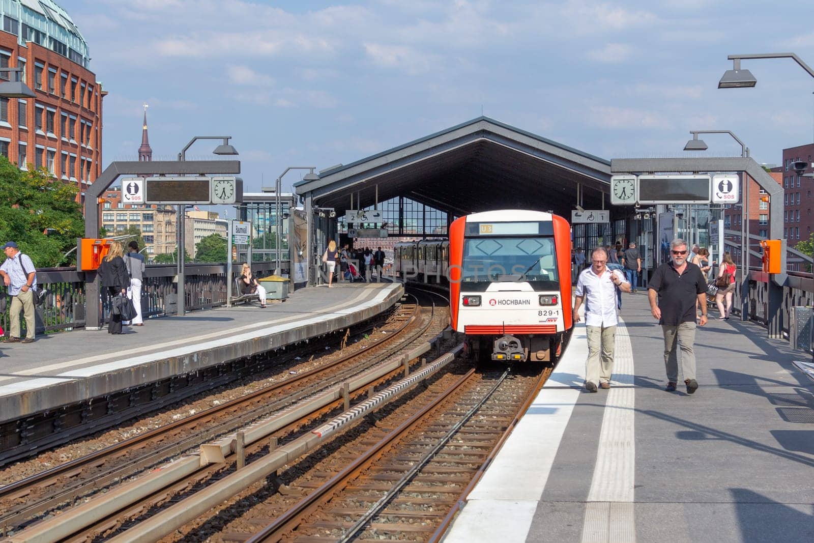 Hamburg, Germany - July 25, 2012: people enter the train at Baumwall U-Bahn Station in Hamburg. Hamburg U-Bahn (Metro Rapid Transit System) was opened in 1912 and comprises four lines with a length of 105 km in 2012.
