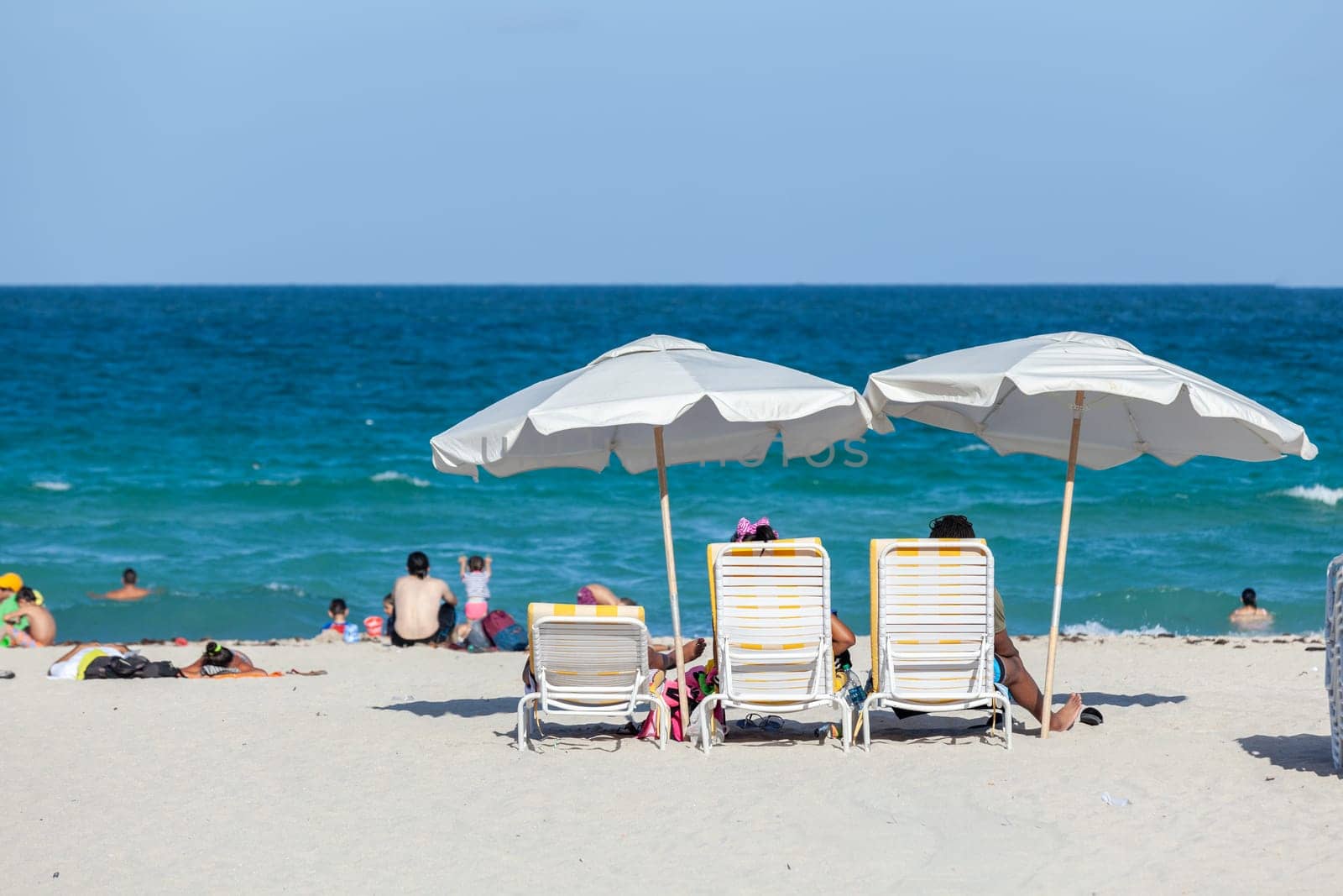 Miami Beach, USA - August 23, 2014: people enjoy the sunny day at south beach in Miami, USA.