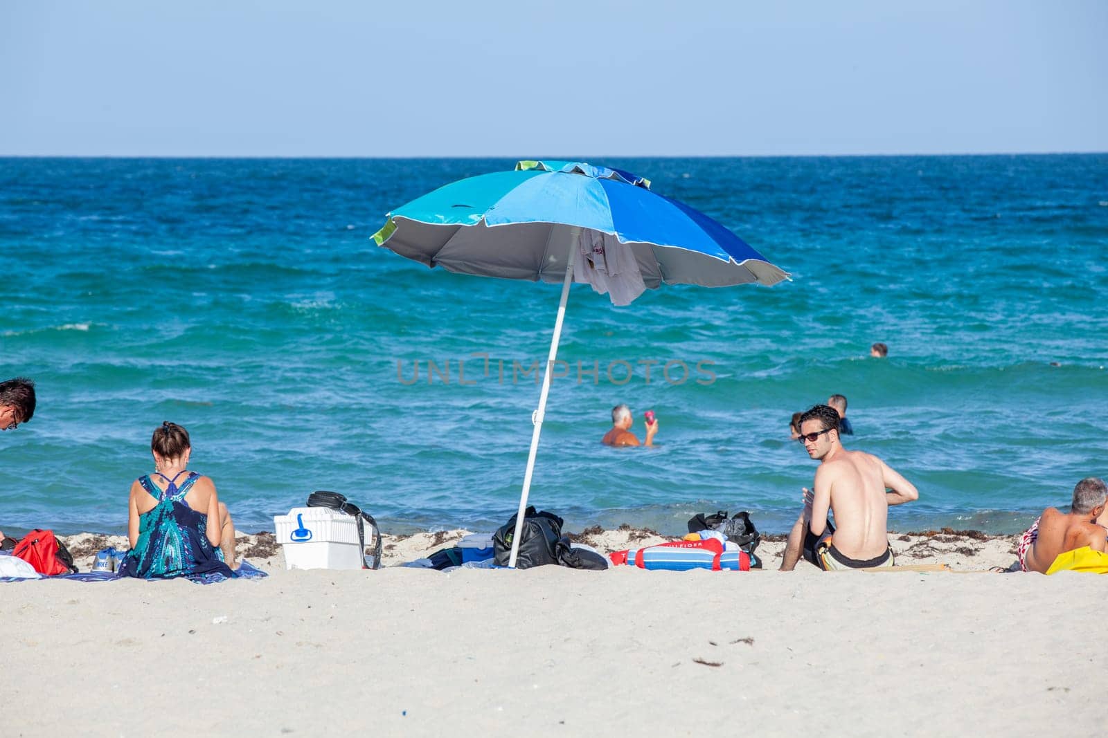 Miami Beach, USA - August 23, 2014: people enjoy the sunny day at south beach in Miami, USA. USA.