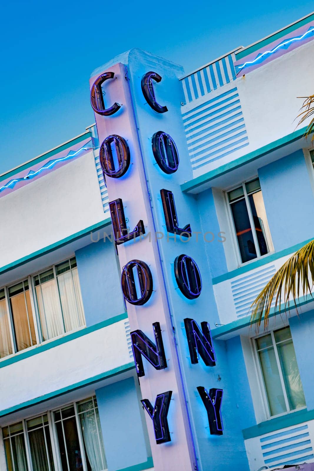 Miami, USA - August 30, 2014: view to neon signage of famous Colony hotel at ocean drive, Miami, USA.