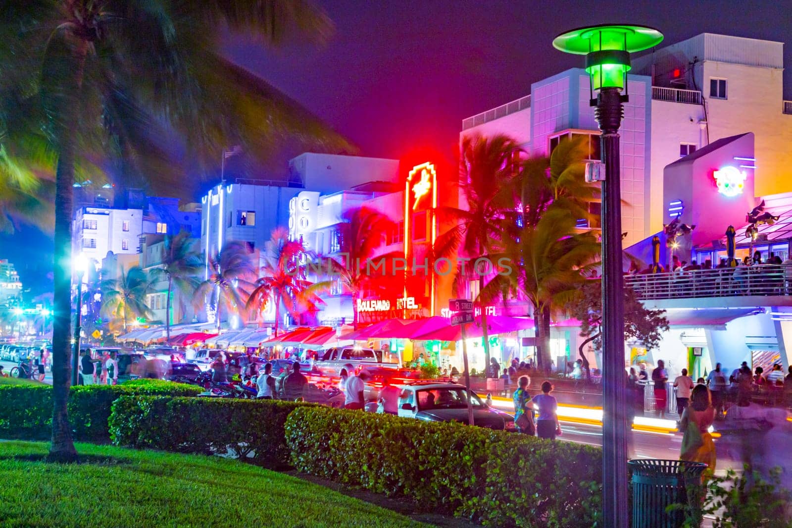 MIAMI, USA - Aug 30, 2014: View along Ocean Drive along South Beach Miami in the historic Art Deco District with hotels, restaurant and bar by night.