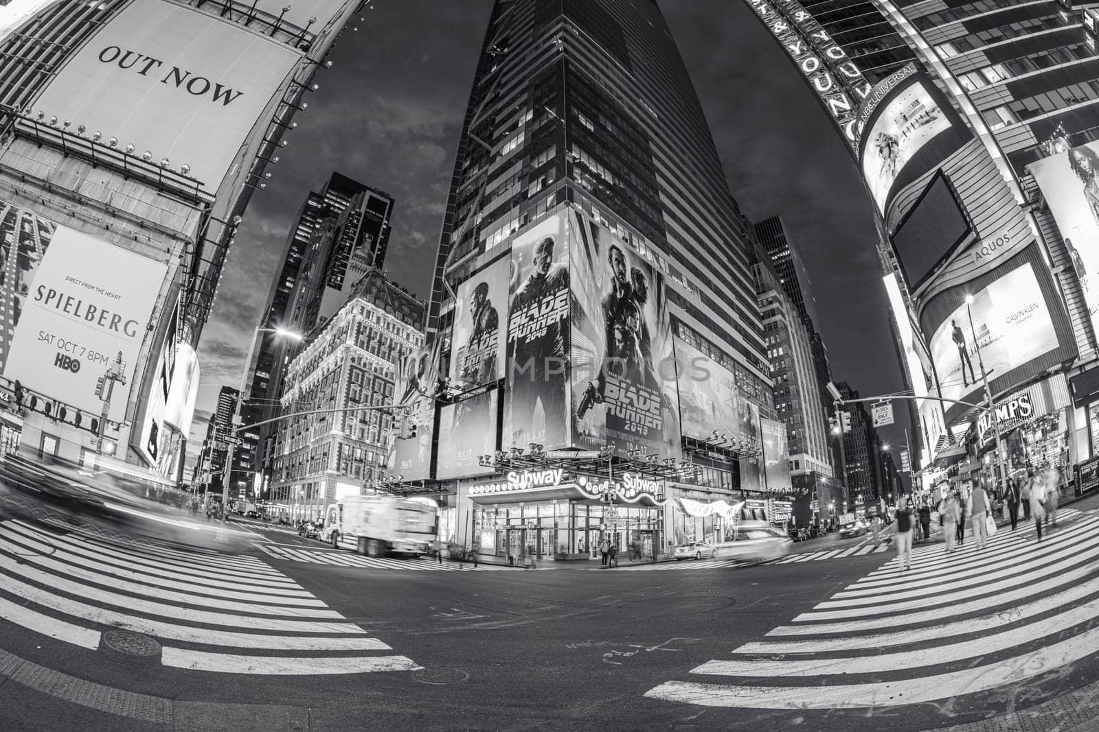NEW YORK, USA  OCT 5, 2017:  neon advertising of News, brands and theaters at times square in early morning. Times square is a symbol for New York life and amusement.