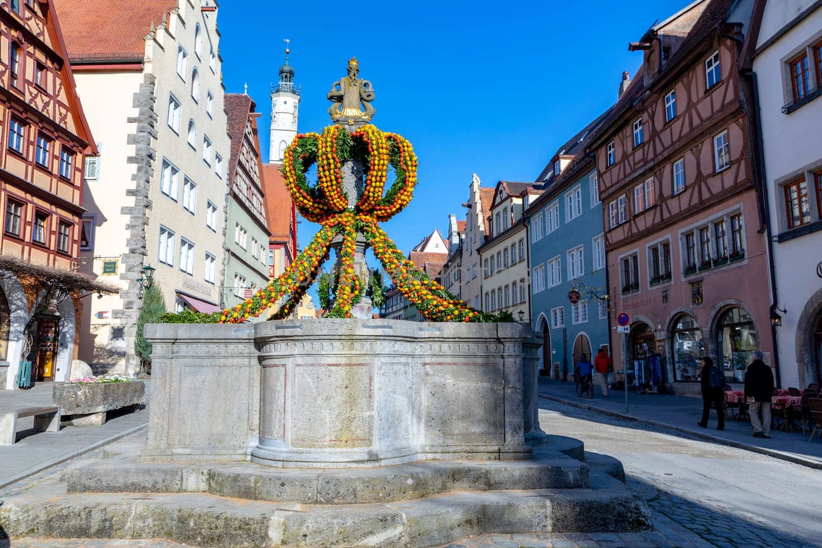 Rothenburg ob der Tauber, Germany - April 6, 2018: colorful easter decoration at a fountain in Rothenburg ob der Tauber.