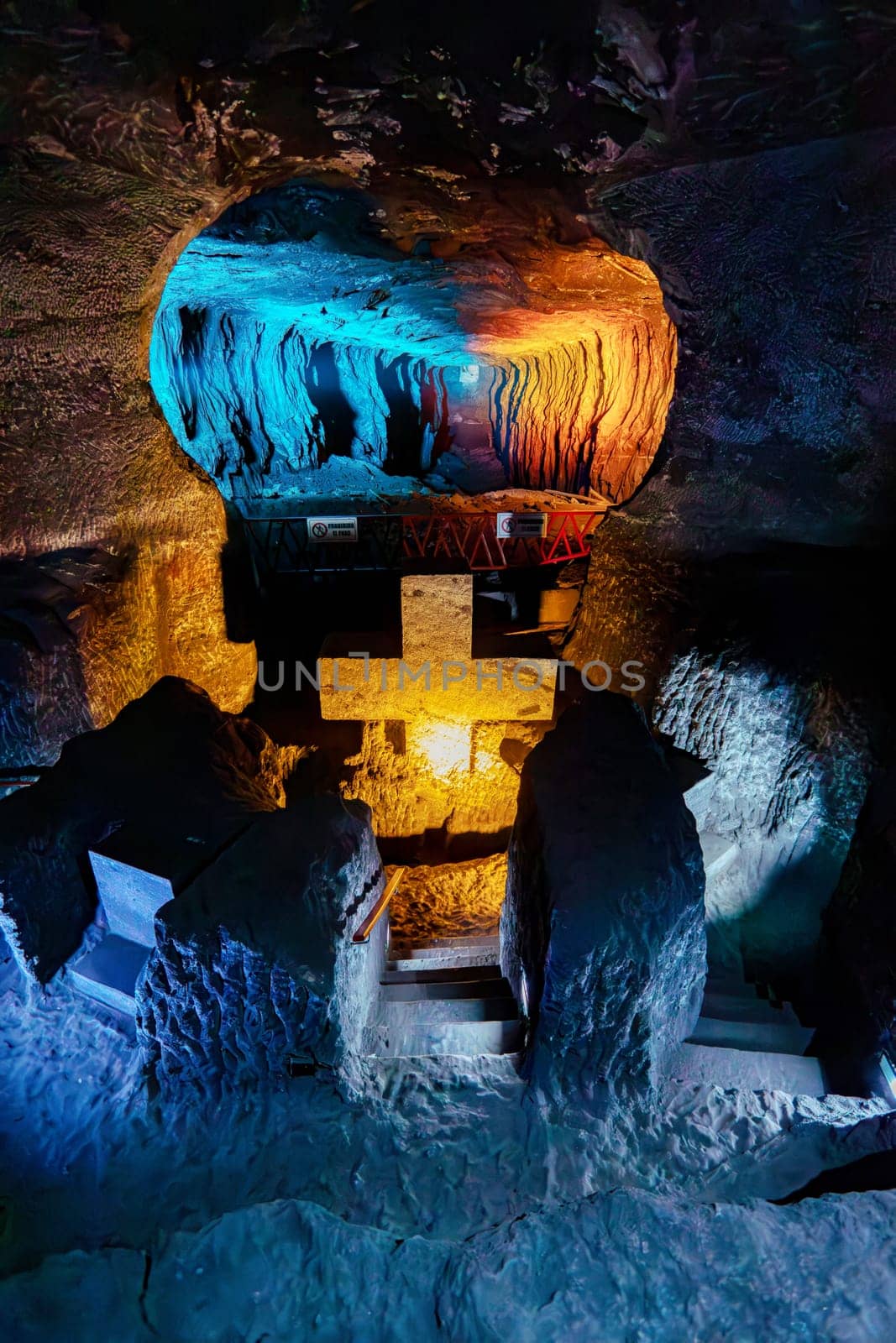 Illuminated cross representing stations of the cross, illustrate events of Jesus last journey, light in underground Catedral de Sal (Salt Cathedral) of Zipaquira, one of Colombian wonders, Colombia.