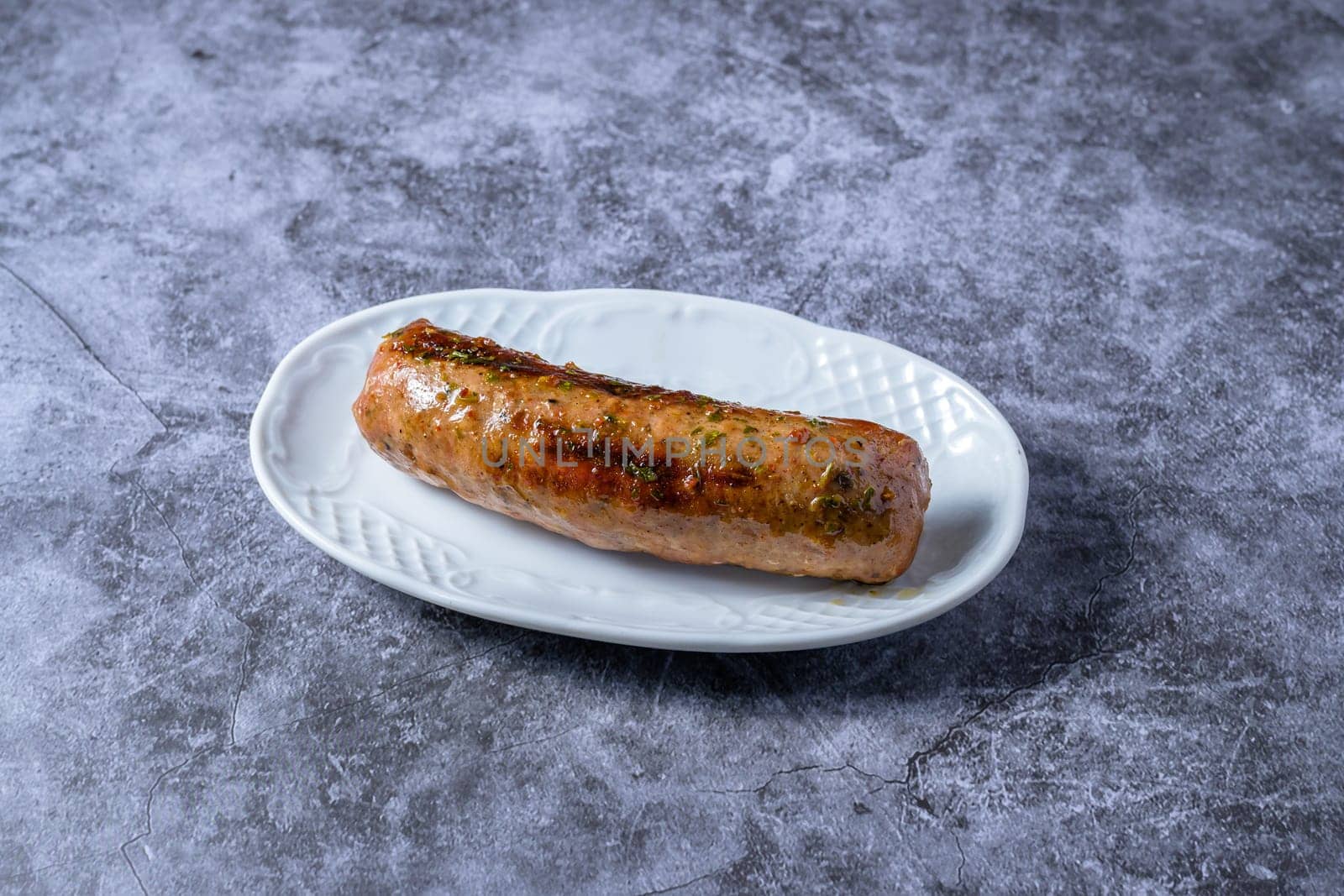 typical argentinean chorizo criollo, grilled