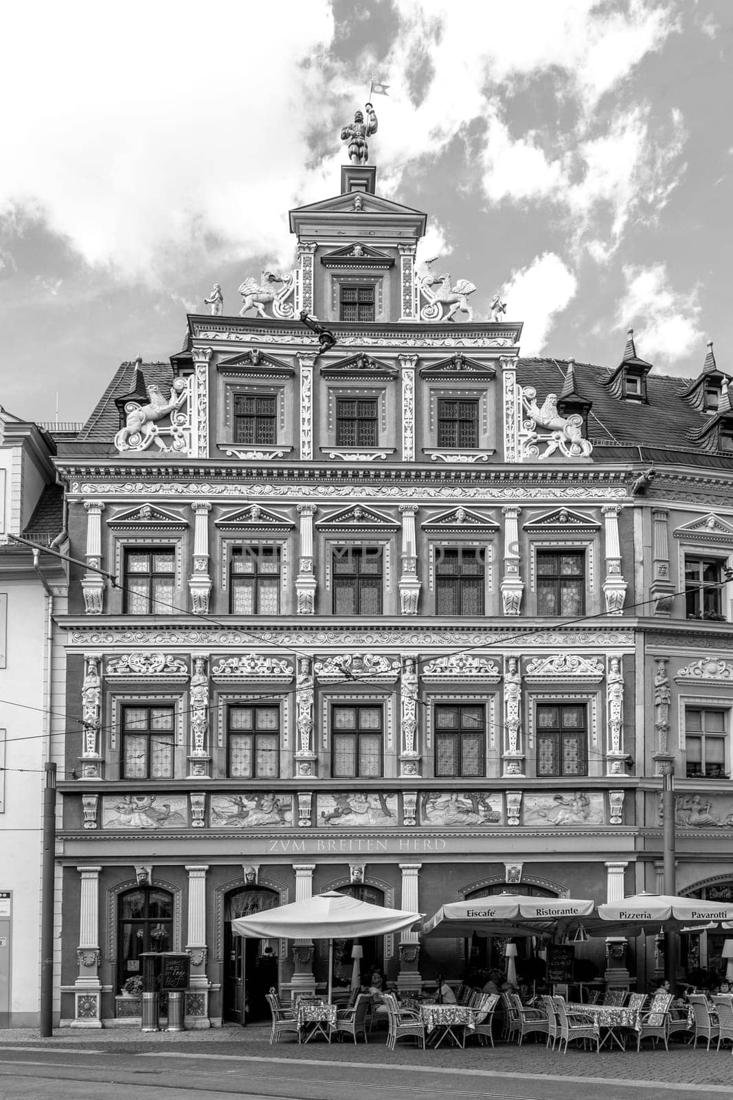 Erfurt, Germany - July 29, 2018: facade at house  ZUM BREITEN HERD  engl: House of wide oven at Fischmarkt, Erfurt, Thuringia, Germany, Europe