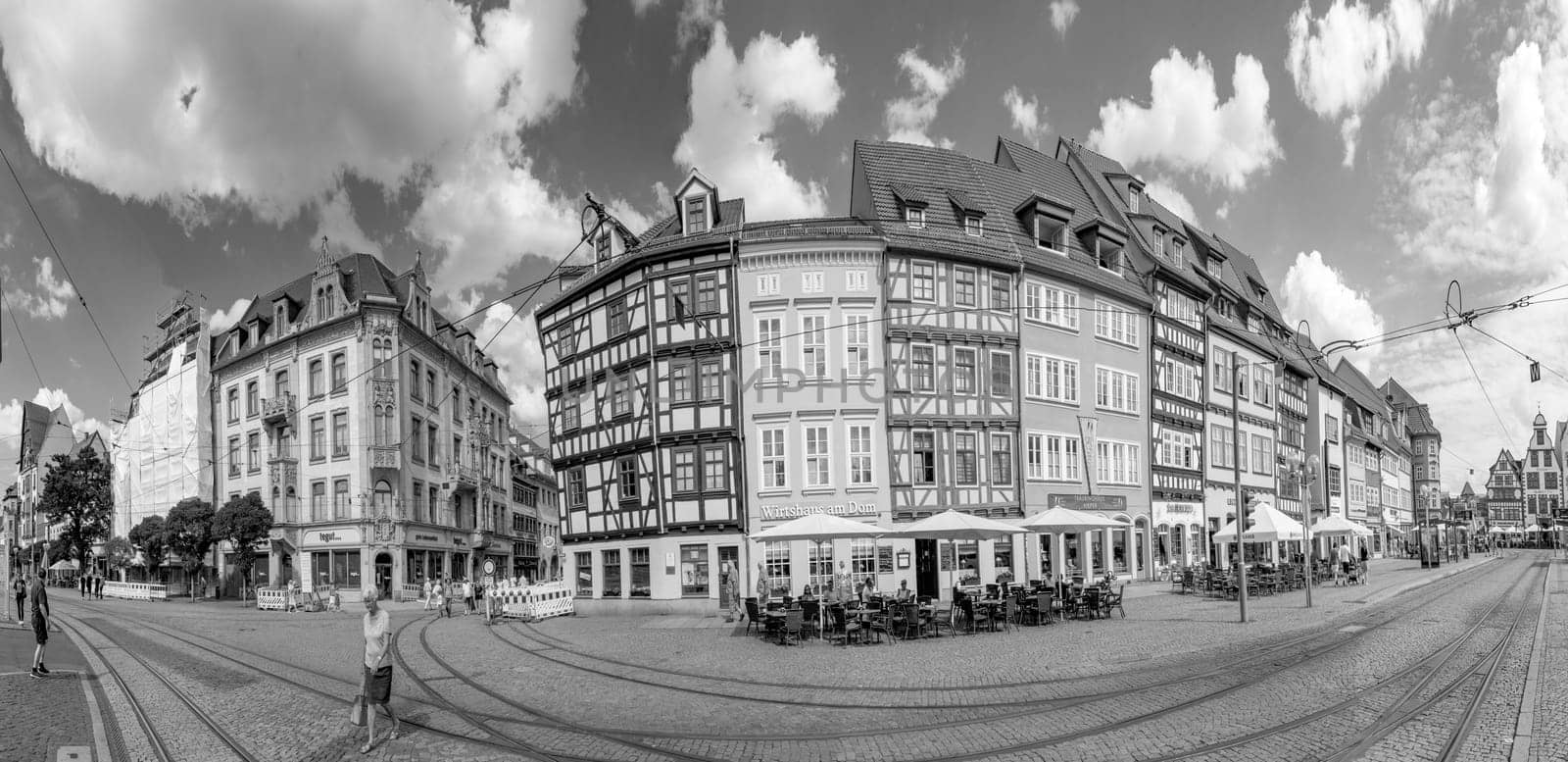 Erfurt, Germany - July 29, 2018: people at the central square in front of the cathedral at the city of Erfurt, Germany. Erfurt is the Capital of Thuringia and the city was first mentioned in 742.