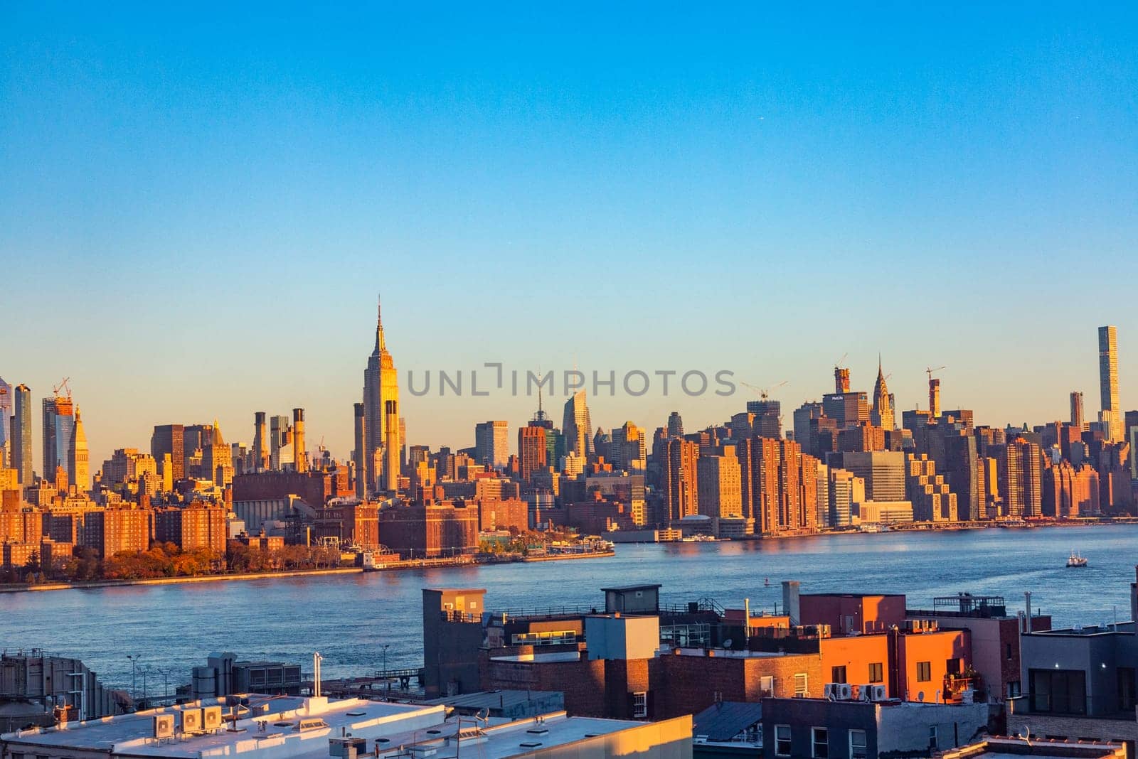 New York, USA - November 7, 2018: view to Skyline of New York in golden sunset light, USA.