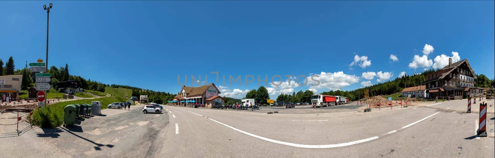 Col de Schlucht, France - June 20, 2018: at the col de Schlucht on a summer day with panoramic view of parking lot and restaurants.
