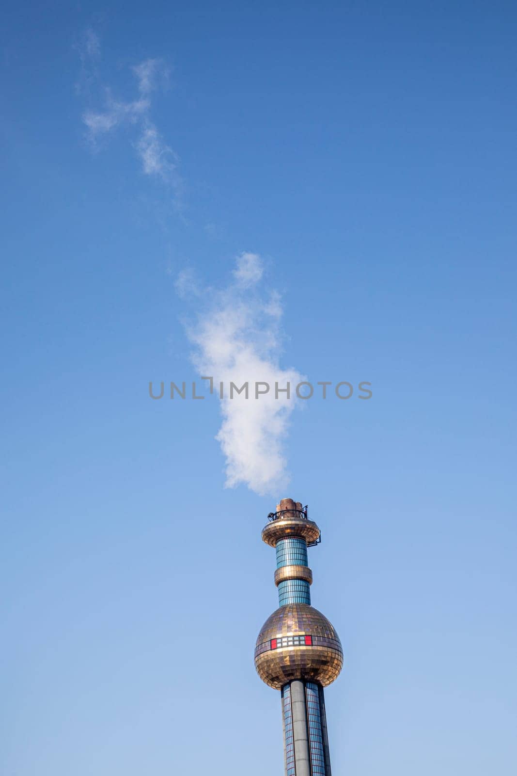Vienna, Austria - February 15, 2019: Spittelau waste incineration plant of the city Vienna (in German Fernwarme Wien) designed by Hundertwasser.