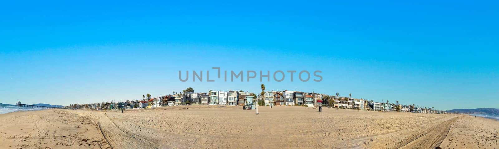Manhattan Beach, USA - March 4, 2019: scenic beach houses at the promenade of Manhattan beach, USA near Los Angeles.