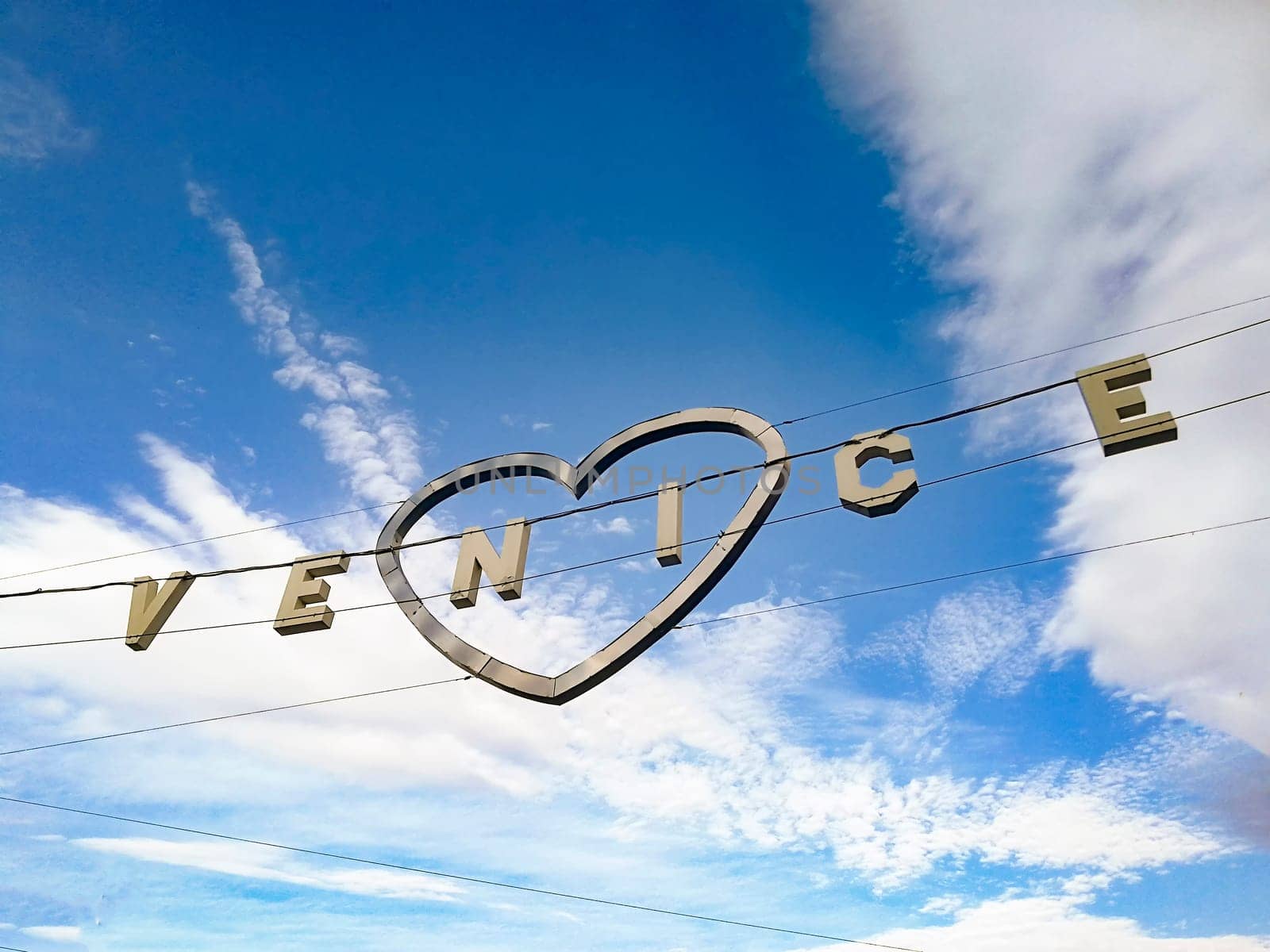 Venice, USA - March 5, 2019: signage Venice with heart as welcome sign in the town of Venice in California.