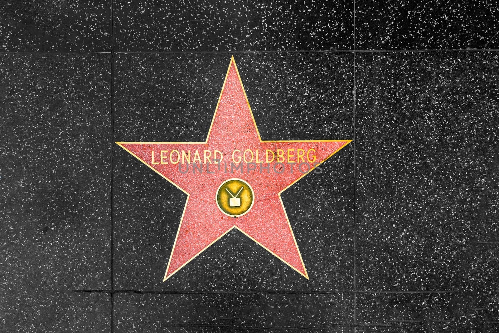 Los Angeles, USA - March 5, 2019: closeup of Star on the Hollywood Walk of Fame for Leonard Goldberg.