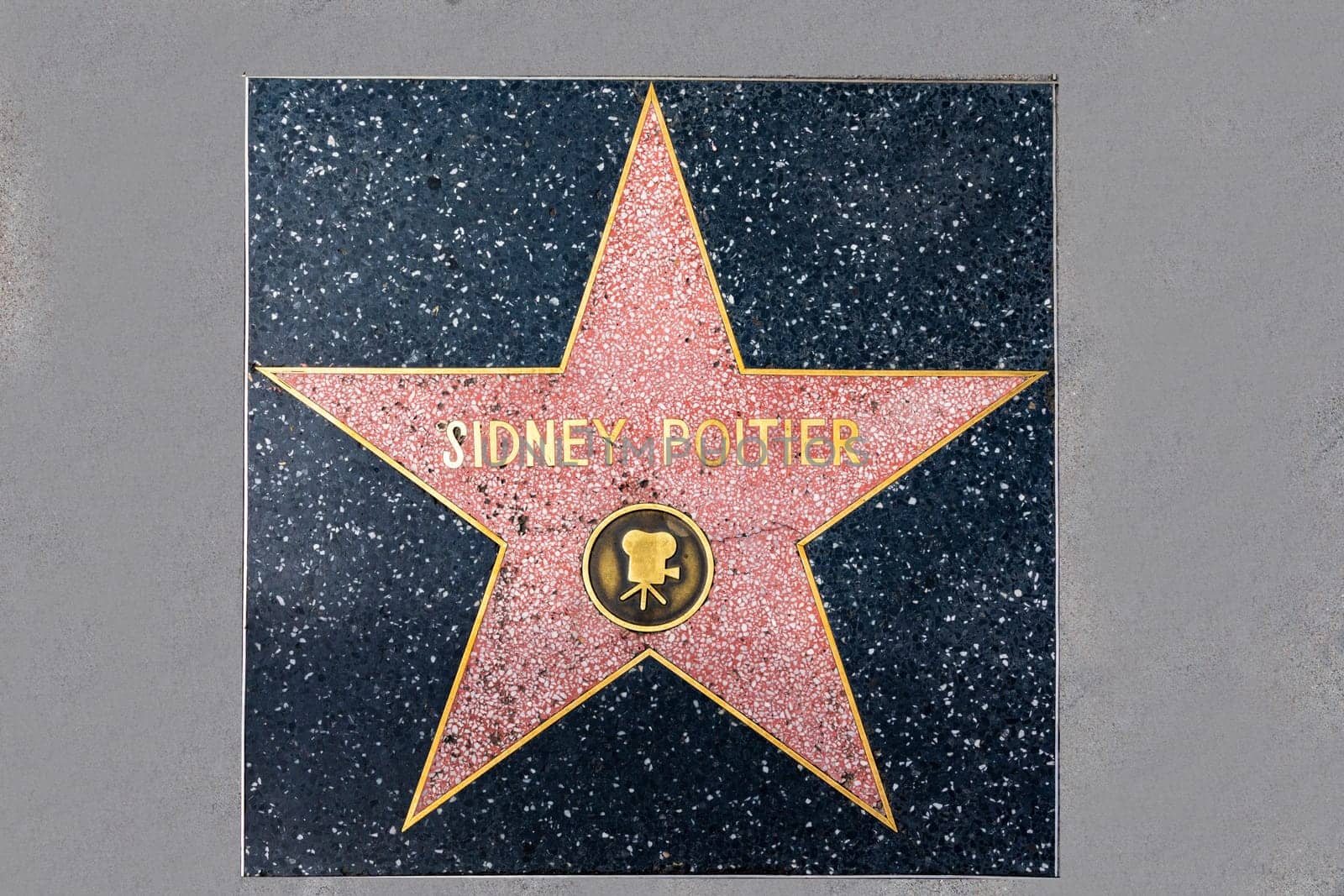 Los Angeles, USA - March 5, 2019:  closeup of Star on the Hollywood Walk of Fame for Sidney Poitier.