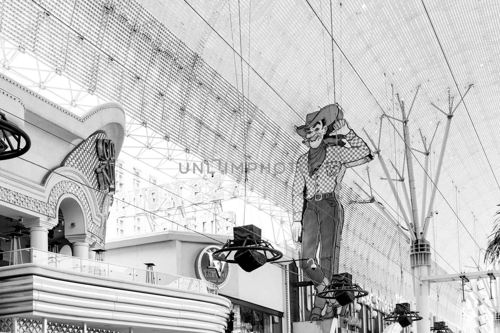 Las Vegas, USA - March 10, 2019: The Las Vegas Vic cowboy neon at the former Pioneer Casino in Las Vegas Fremont street. The classic sign was built in 1951.