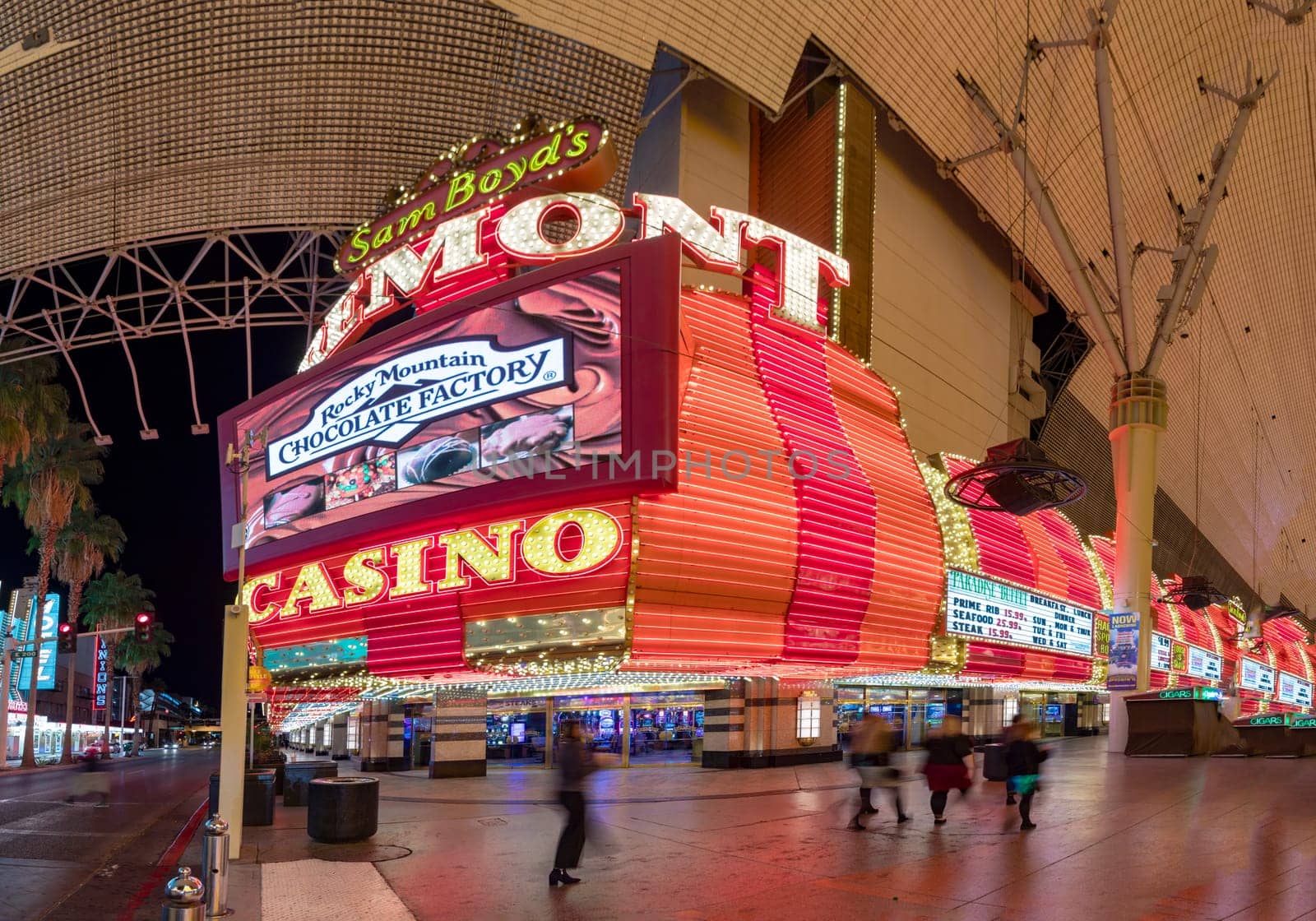 Las Vegas, USA - March 11, 2019: casino Fremont with neon advertising by night in Fremont street experience in Las Vegas, USA.