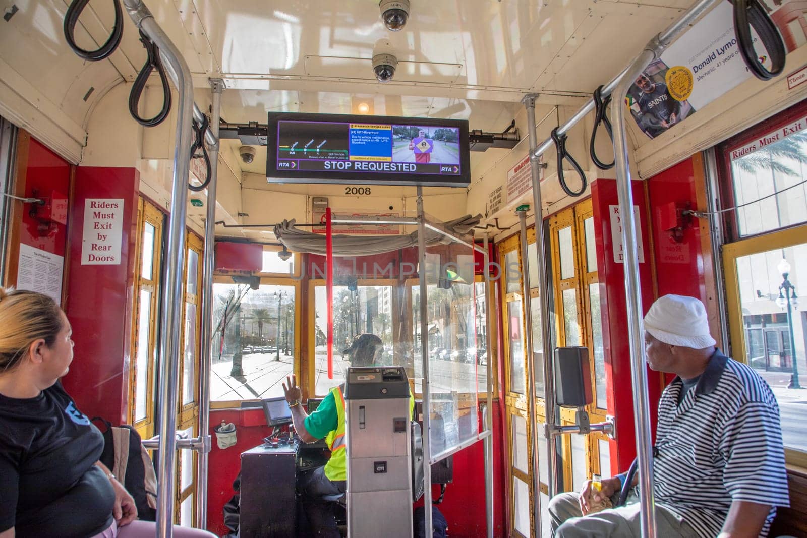 New Orleans, USA - October 25, 2023: people in New Orleans use the street car in early morning to go to town and work.