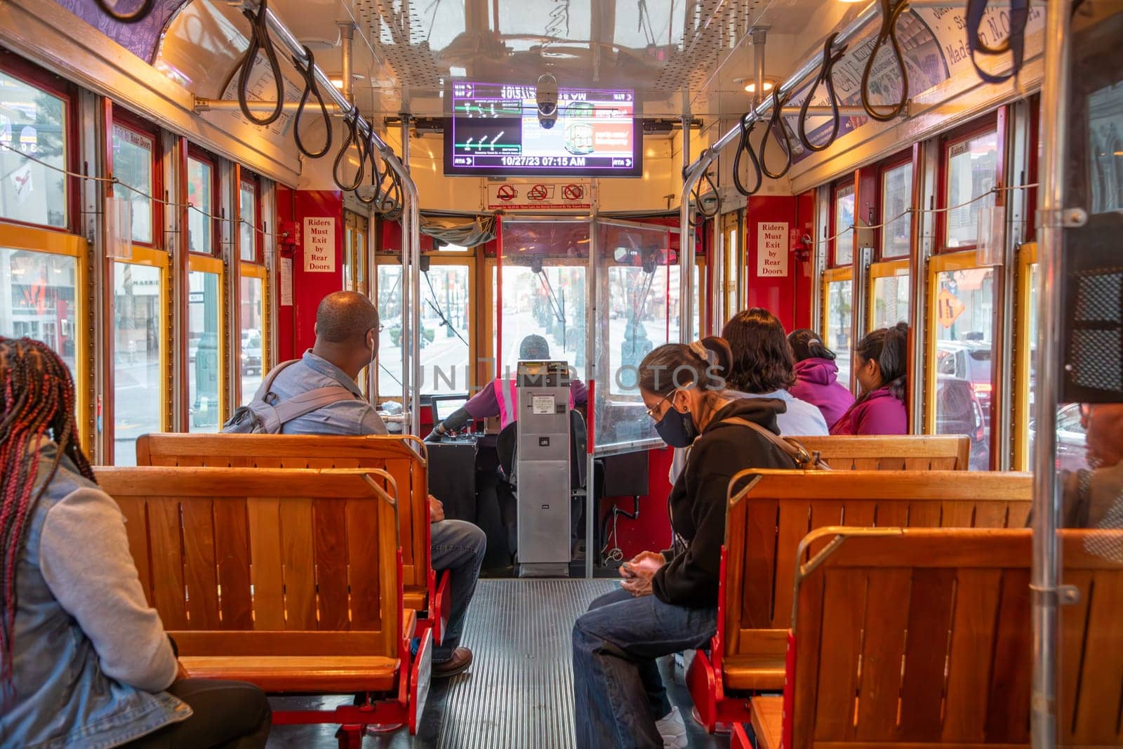 New Orleans, USA - October 27, 2023: people in New Orleans use the street car in early morning to go to town and work.