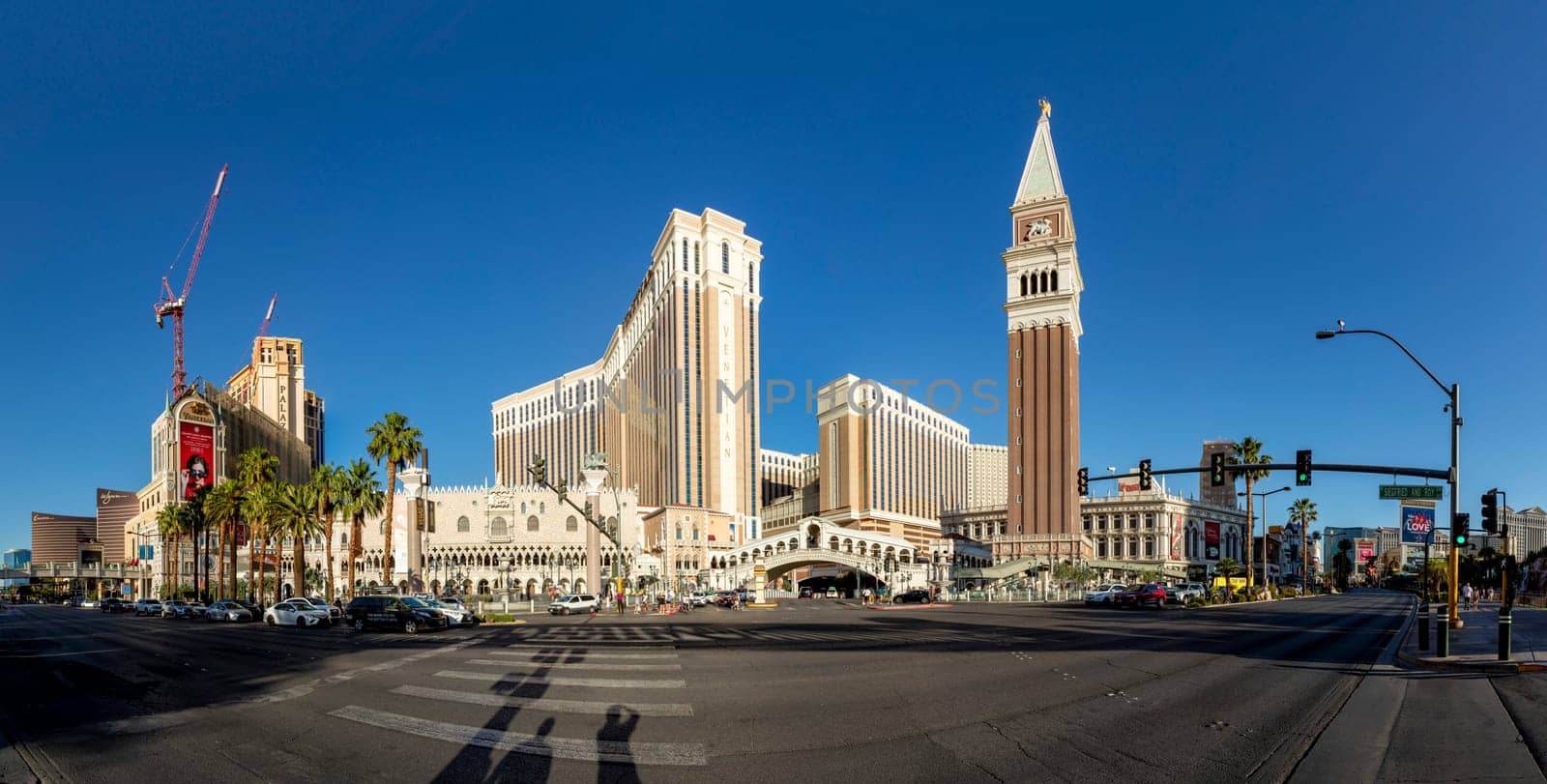 Las Vegas, USA - May 24, 2022: view to hotels and casinos at the Strip in daytime with neon advertising.