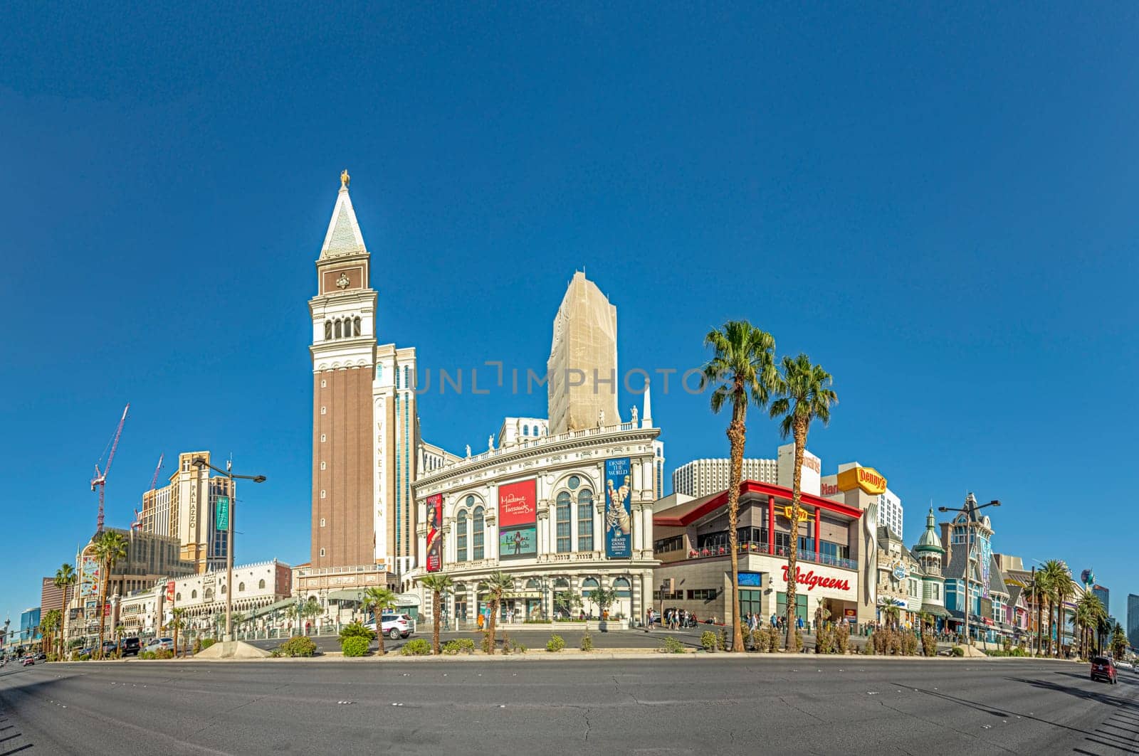 Las Vegas, USA - May 24, 2022: view to hotels and casinos at the Strip in daytime with neon advertising.