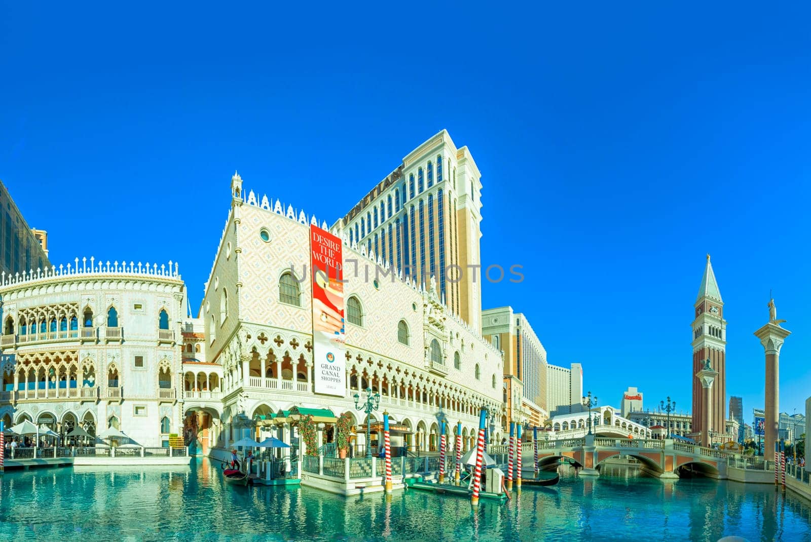 Las Vegas, USA - May 24, 2022: view to the Venetian resort and casino with replica of Grand canal with Rialto bridge and gondolas, replica of Venice in Italy.
