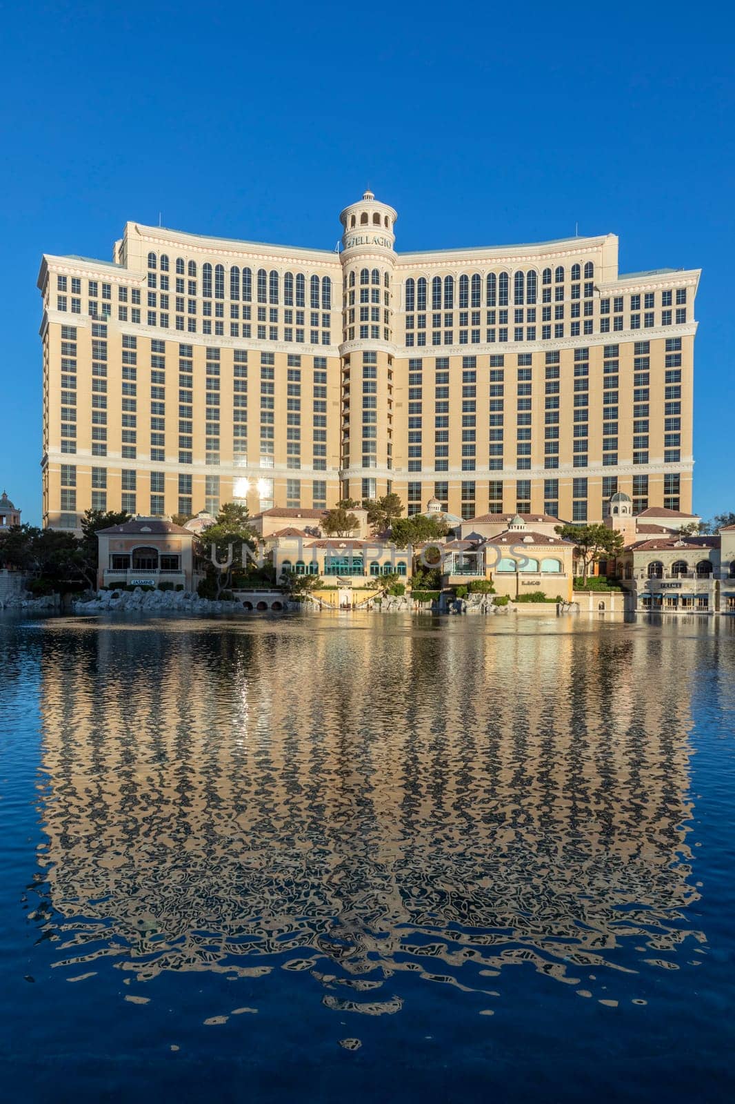 Las Vegas, USA - May 25, 2022: view to Bellagio hotel with reflection in the lake in early morning light, Las Vegas, USA.