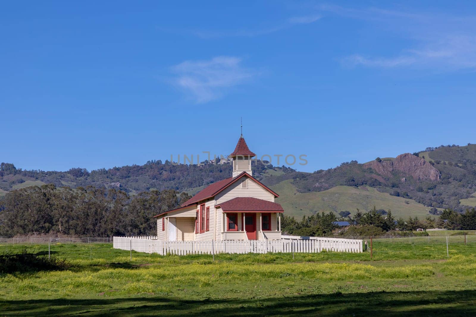 San Simeon, USA - March 15, 2019:  Located just off Highway 1, and in the shadow of Hearst Castle, this restored schoolhouse has been standing since 1903.