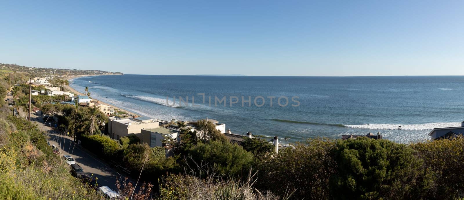 Malibu, USA - March 16, 2019: beautiful houses at wooden support poles at the scenic beach in Malibu, California, USA.