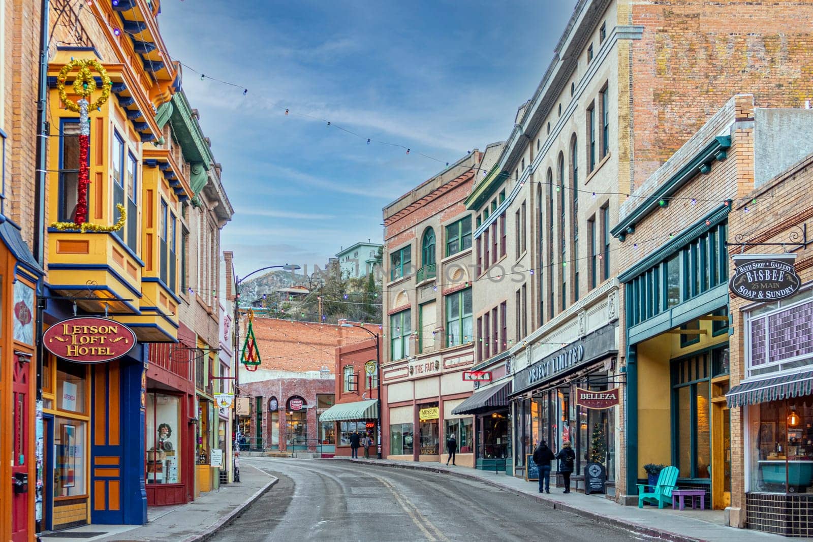 Bisbee, USA - December 29, 2019: Buildings lining Main Street on a clear day at the edge of Bisbee, Arizona