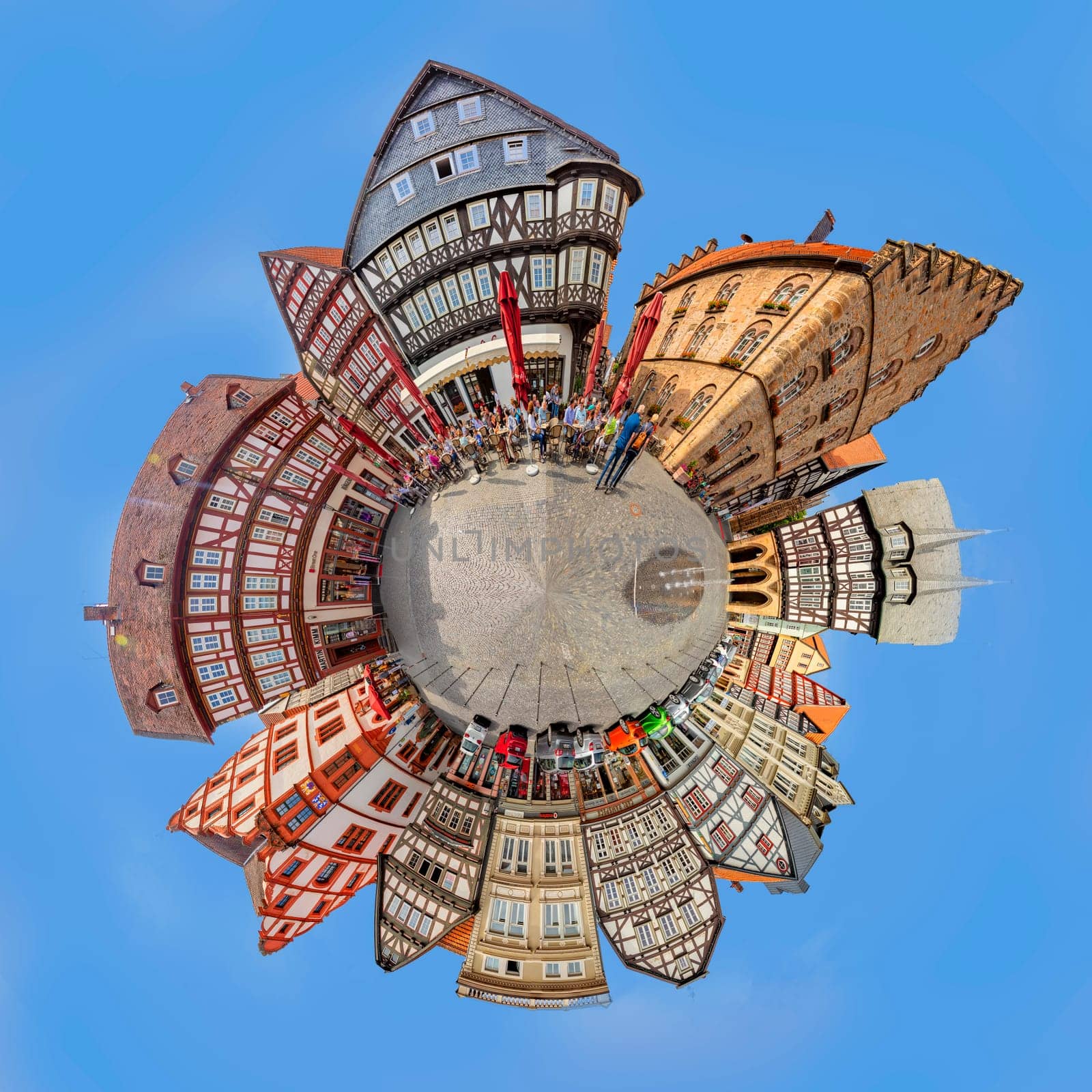 Alsfeld, Germany - June 25, 2021: famous town hall and half timbered historic houses at central square in Alsfeld, germany.
