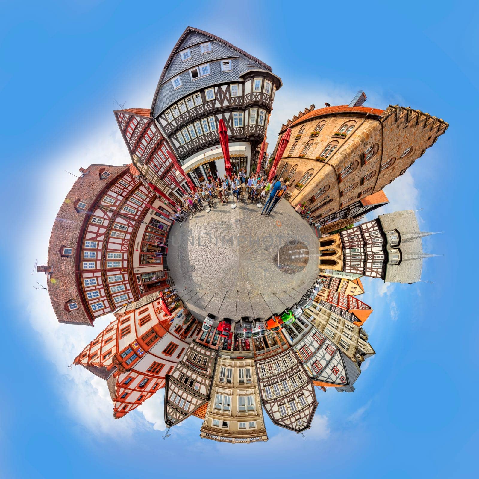 Alsfeld, Germany - June 25, 2021: tiny world format at famous town hall and half timbered historic houses at central square in Alsfeld, germany.